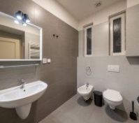 Bathroom with bathtub & shower, toilet, bidet