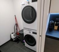 Utility closet with full washer and drier
