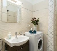 Bathroom with shower, toilet and wasching machine