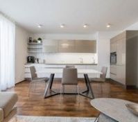 Kitchen & Living room with direct access to the terrace oriented to the South. All windows within the apartment have installed electric blinds.